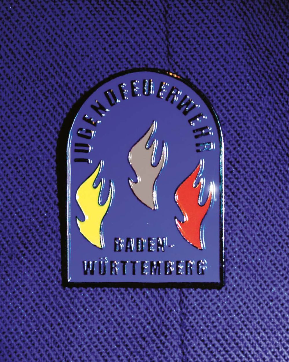 Jugendflamme Stufe II auf einer Jugendfeuerwehr-Uniform